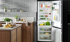 Open fridge freezer in kitchen